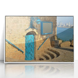 Art Deco poster of Tel Aviv skyline in muted gray and blue tones on white framed acrylic, ideal for modern art wall decor.