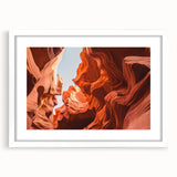 Abstract art print of a Middle Eastern landscape in muted earth tones, framed with a white mat.