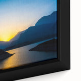 Close-up of black wall art featuring textured, colorful Middle Eastern scenery on a framed canvas.