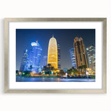 Textured abstract art print of a Middle Eastern scenery in muted earth tones, framed in silver, suitable for bedroom decor.