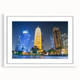 Abstract art print depicting a stylized Middle Eastern landscape in muted earth tones on a white matted frame.