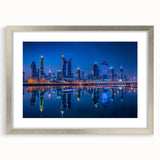 Textured abstract art print depicting a Middle Eastern desert scene in muted earth tones on a framed canvas.