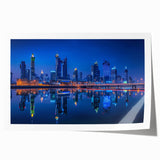 Rolled print of a Middle Eastern scenery with floral accents in soft earth tones.