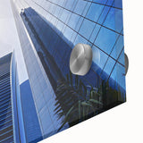 Large abstract wall art depicting the Abu Dhabi skyline in muted earth tones on acrylic glass, ideal for dining room art.