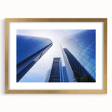 Extra large abstract art print of Abu Dhabi scenery in gold frame, featuring textured elements and earthy tones.