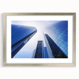 Textured abstract art print of Abu Dhabi skyline in silver frame, ideal for modern bedroom ambiance.