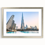 Textured art print of Burj Khalifa in abstract style with muted gray and silver tones, framed in silver.