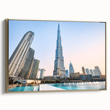 Framed canvas wall art featuring a side view of the Burj Khalifa amidst a black and gold vintage landscape.