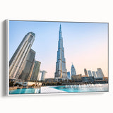 Vintage poster art of Burj Khalifa with colorful skyline on extra large framed canvas, ideal for living room decor.