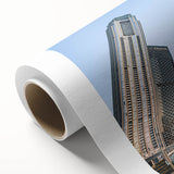 Art Deco poster of Burj Khalifa on rolled canvas, with muted metallic tones, ideal for nursery wall art or dining room.