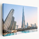 Side view of a large stretched canvas depicting the Burj Khalifa amidst a vibrant cityscape, ideal for kitchen wall art.