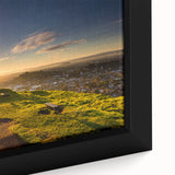Extra large framed canvas depicting Auckland's skyline in black with colorful, textured highlights.