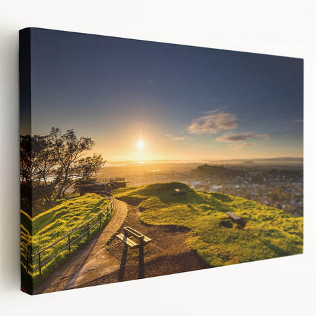 Side view of a stretched canvas featuring a detailed Auckland skyline in muted blue and green tones.
