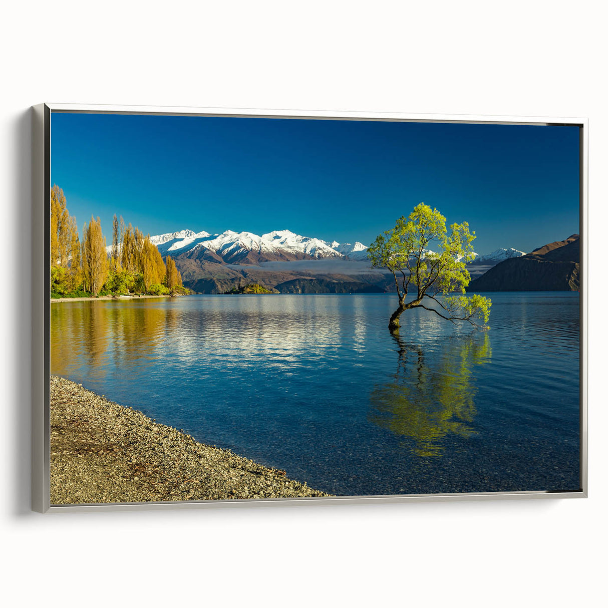 Landscape art painting of Otago, New Zealand in muted colors on a silver-framed canvas, suitable for office decor.