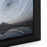Black wall art featuring a textured depiction of Mount Taranaki in vibrant colors on a framed canvas.