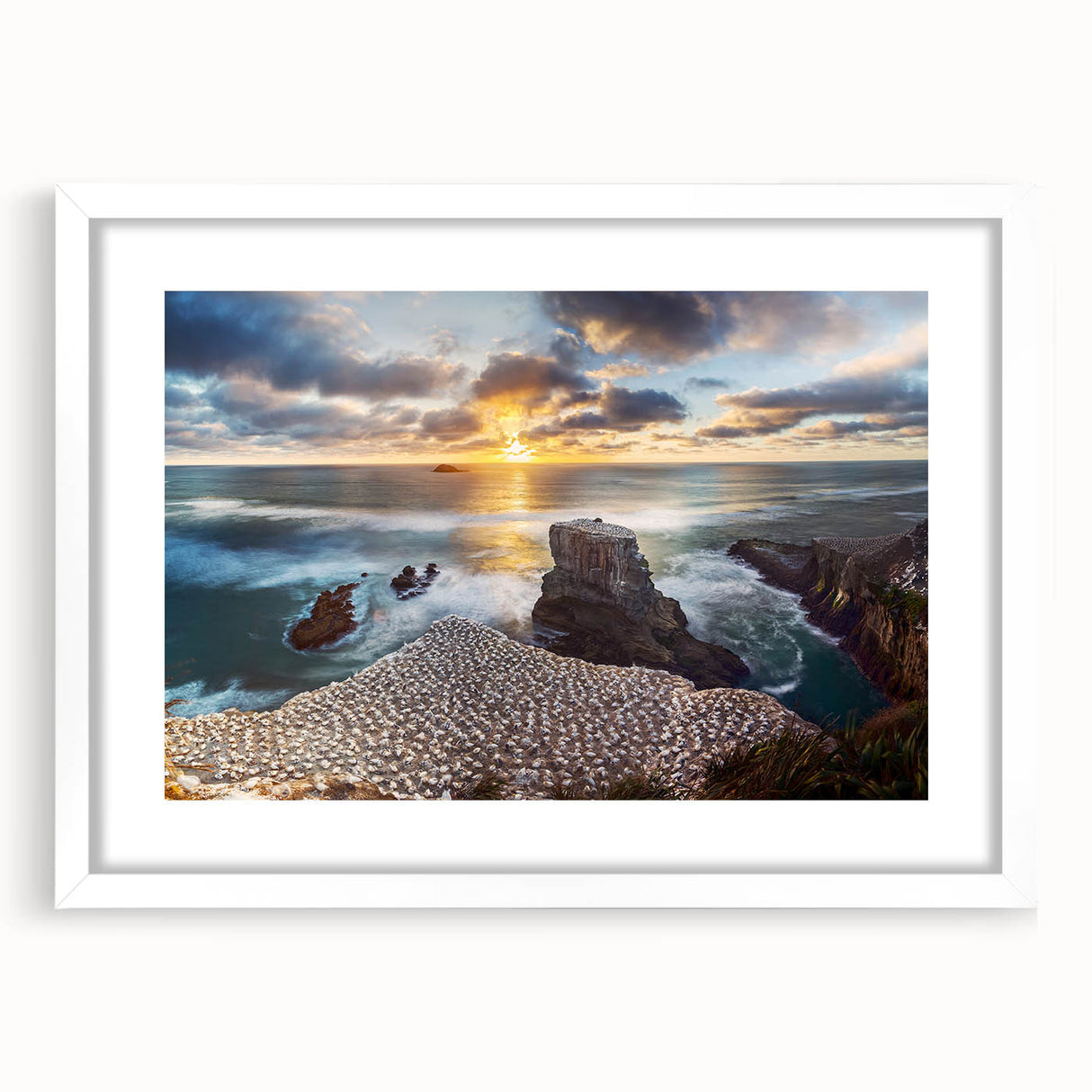 Abstract art print of New Zealand's West Coast in muted gray and blue tones, framed with a white mat.