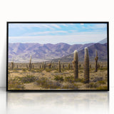 Large abstract wall art depicting a stylized Argentine landscape in muted earth tones, framed in black acrylic.