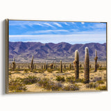 Framed canvas featuring a vintage-style landscape painting of Argentina's mountains in black and gold tones.