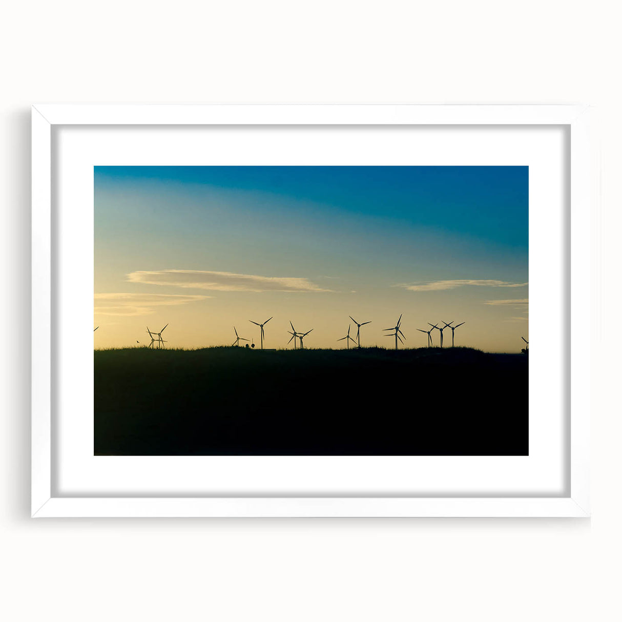 Abstract art print of a stylized Brazilian landscape in muted earth tones, framed with a white mat.