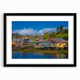 Extra large colorful art print of abstract Santiago scenery, textured in style, framed in black, ideal for living room decor.