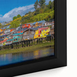 Framed canvas of a textured black wall art depicting Santiago, Chile, with colorful abstract elements.