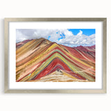 Textured art depicting abstract scenery of Peru with earthy tones on a framed silver mat, suitable for bedroom decor.