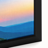 Close-up of textured black wall art featuring a vibrant, colorful Alabama scenery on a framed canvas.