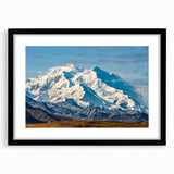 Colorful abstract art print of Denali, Alaska, in a black frame with mat, featuring textured brush strokes.