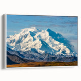 Vintage poster art of Denali, Alaska in colorful tones on a white-framed, extra-large canvas, ideal for living room decor.