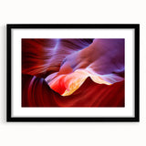 Extra large abstract art print of Arizona Antelope Canyon in vibrant, textured colors on a framed black mat.