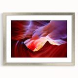 Textured art print of Antelope Canyon with abstract patterns in earthy red and orange tones, framed in silver.