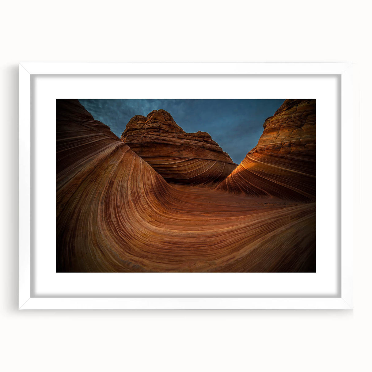 Abstract art print of Arizona's Coyote Buttes in earth tones on a white-framed mat, suitable for bedroom or dining room.