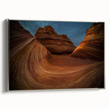 Framed canvas of Coyote Buttes in Arizona, featuring earthy red and orange tones.