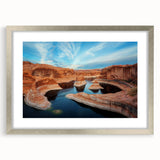 Textured art print of Glen Canyon in Arizona, featuring earthy tones on a framed silver mat, ideal for bedroom decor.