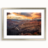 Textured art print of the Grand Canyon in muted earth tones on a framed silver mat, ideal for bedroom art.