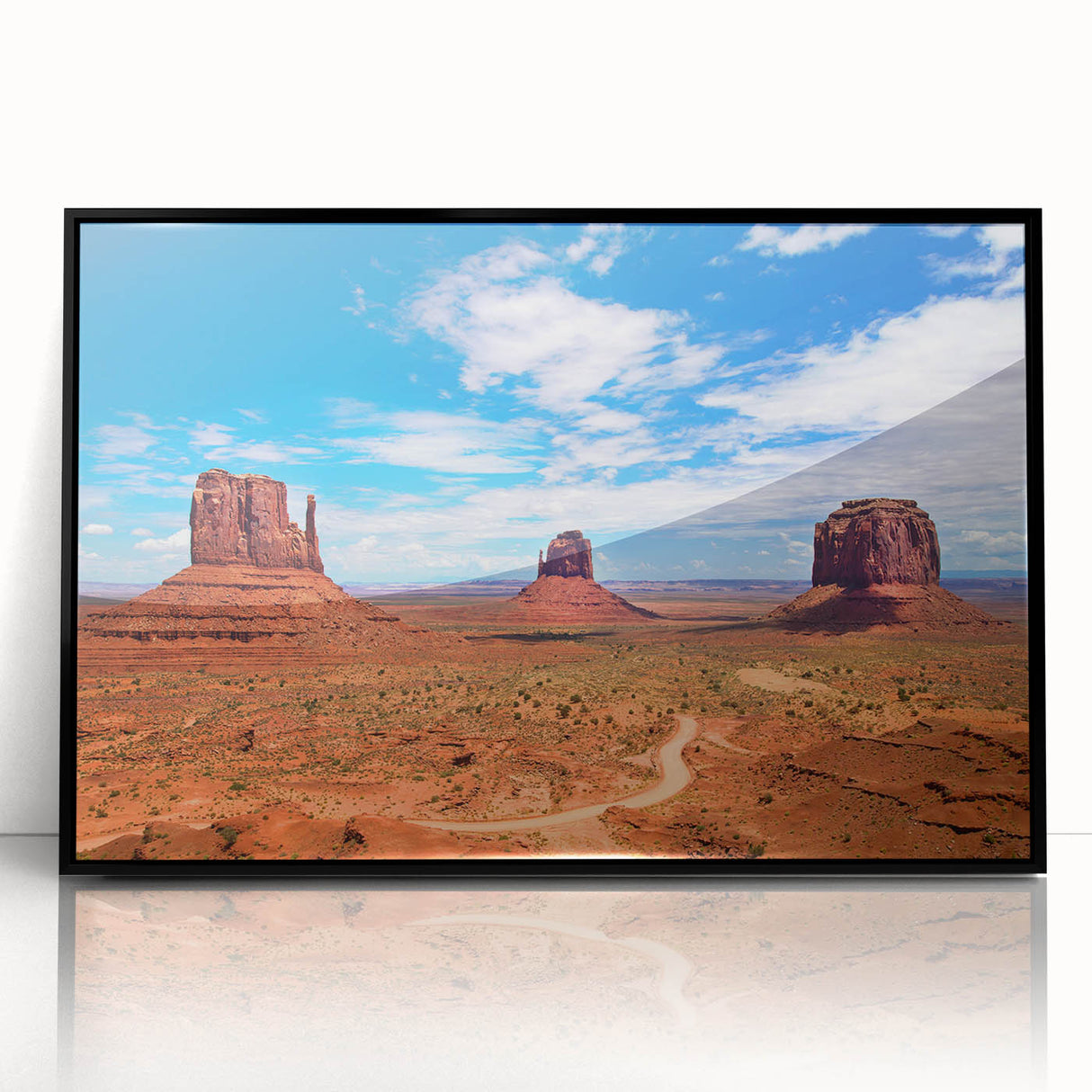 Large abstract wall art depicting Monument Valley in muted earth tones on a framed acrylic.
