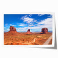 Monument Valley landscape on rolled print, featuring earthy red and orange tones, suited for dining room wall art.