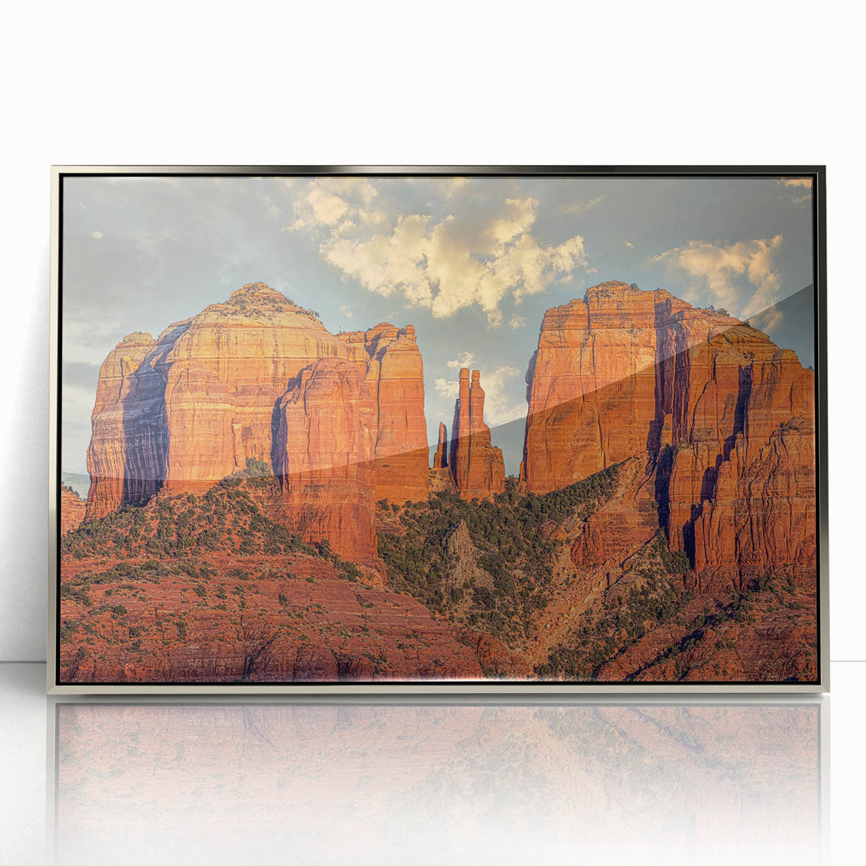 Mid-century modernist art depicting the Sedona landscape in muted earth tones on a silver-framed acrylic panel.
