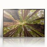 Mid-century modernist art depicting the Big Sur coastline in muted blue and green tones, framed in silver acrylic.