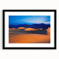 Abstract art print of Death Valley in vibrant, textured colors on a large framed canvas, ideal for living room decor.
