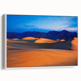 Vintage poster art of Death Valley in a white framed canvas, featuring a colorful desert landscape.