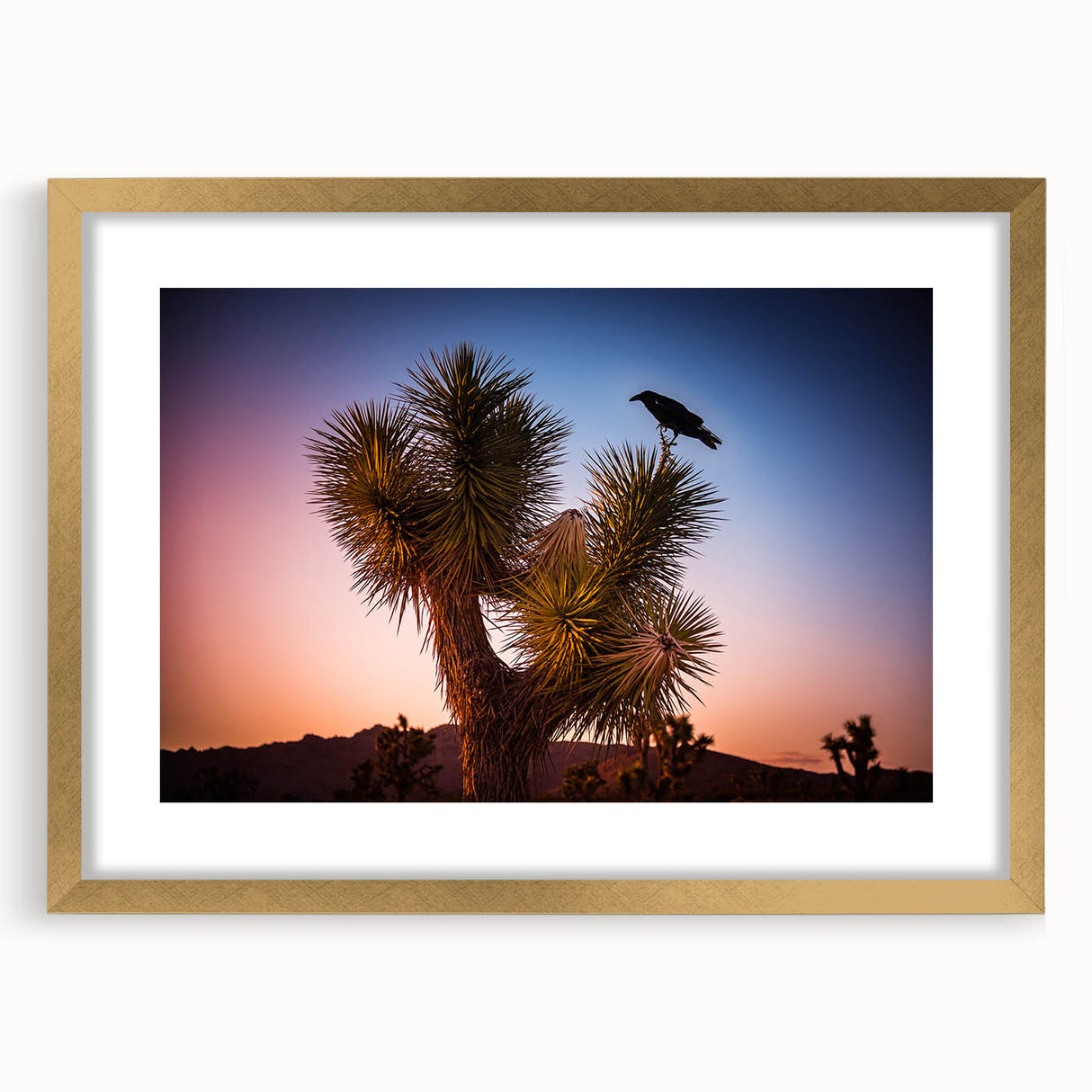 Extra large abstract art print of Joshua Tree, featuring textured brush strokes in earth tones, framed in gold.