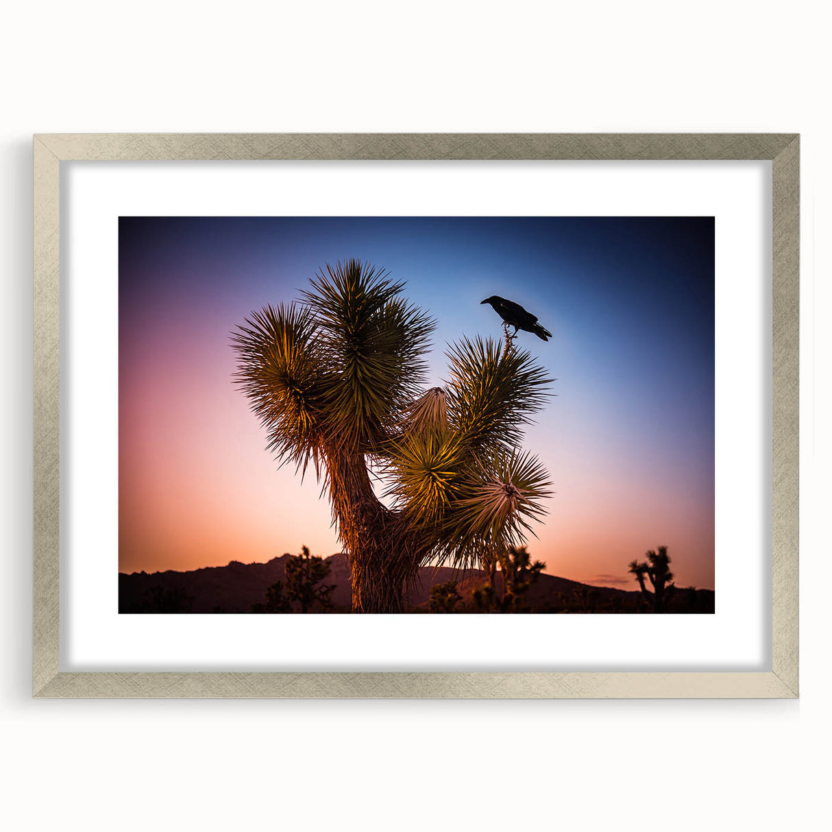 Textured art print of Joshua Tree in muted earth tones on a framed canvas, suitable for bedroom decor.
