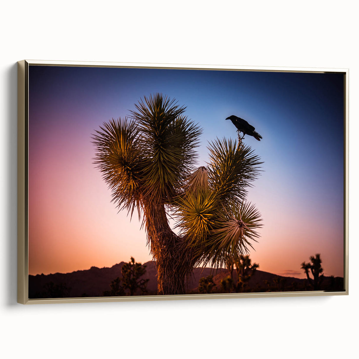 Framed canvas featuring a vintage-style landscape of Joshua Tree, with muted earth tones, ideal for bedroom wall art.