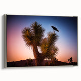 Framed canvas of a Joshua Tree landscape in muted earth tones, ideal for adding a vintage touch to living room decor.