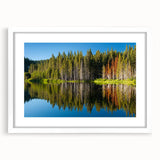 Abstract art print of Lake Tahoe in muted blue and green tones, framed with a white mat.