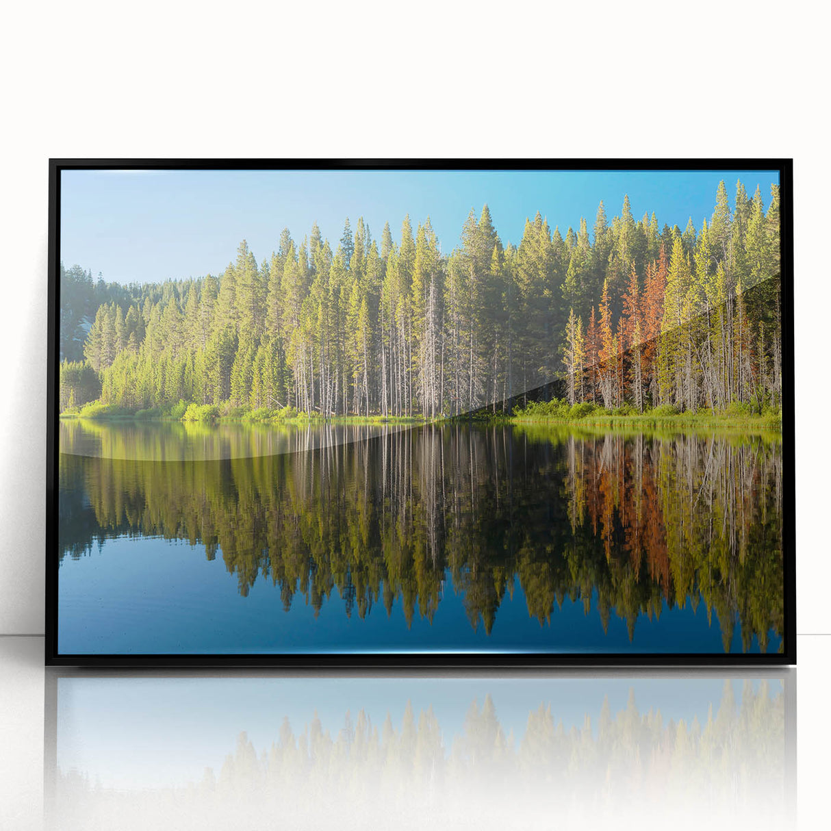 Large abstract wall art of Lake Tahoe in muted blue and green tones on a framed acrylic, ideal for modern living room decor.
