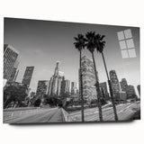 Large abstract wall art depicting the Los Angeles skyline in muted gray and blue tones on acrylic glass.