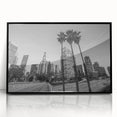 Large abstract wall art depicting Los Angeles skyline in muted gray, framed in black acrylic.