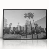 Large abstract wall art depicting Los Angeles skyline in muted gray, framed in black acrylic.